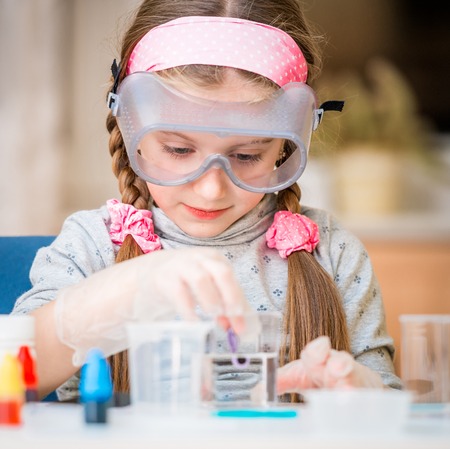 happy little girl with flasks for chemistry homeschool happy little girl with flasks for chemistry homeschool