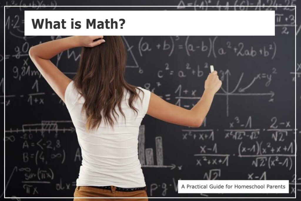 The girl is writing math formulas on the blackboard